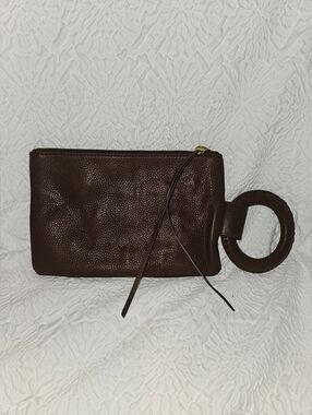 NWOT Hobo Storm Clutch in the color Acorn